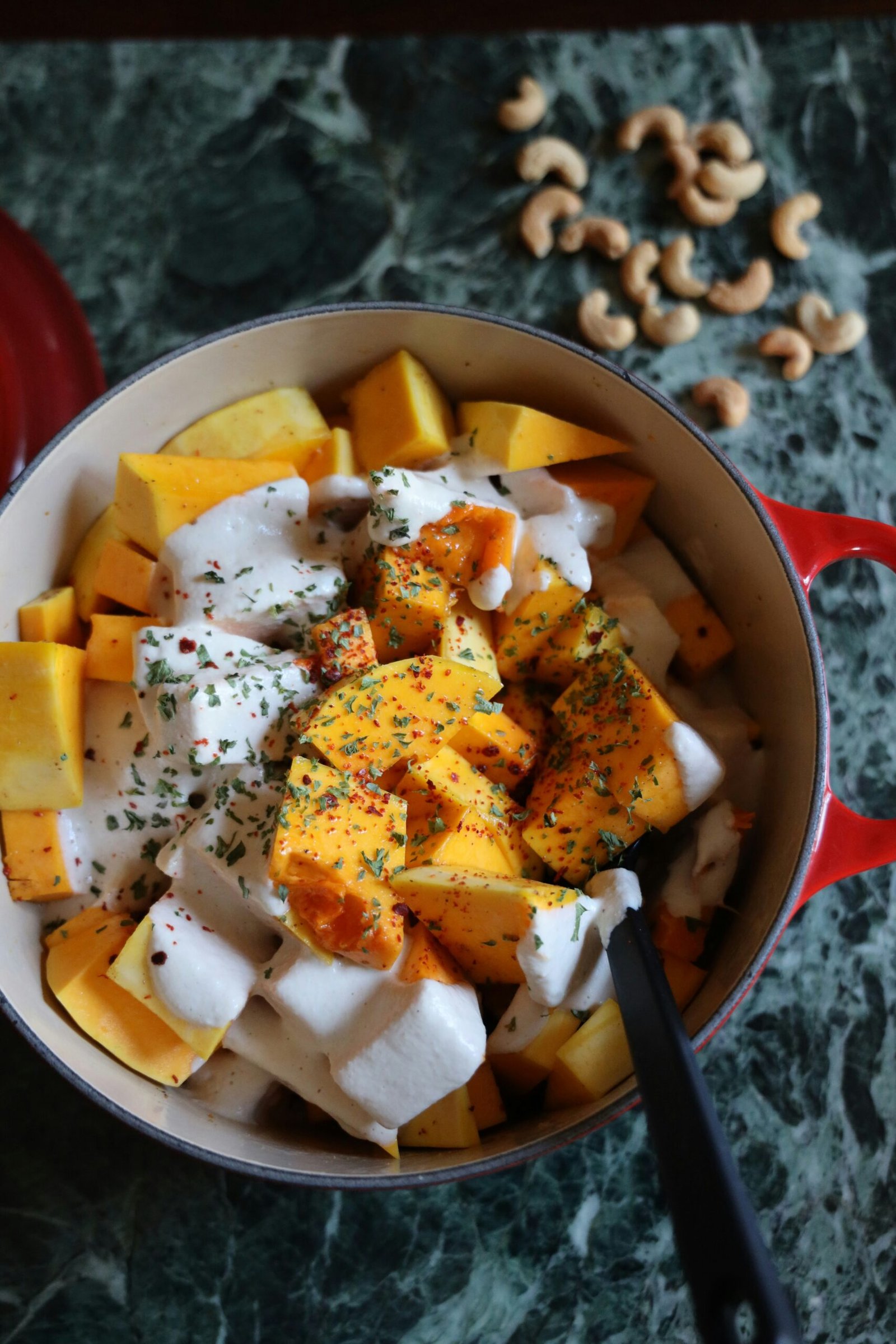 Finished apple pumpkin salad plated beautifully on a white platter