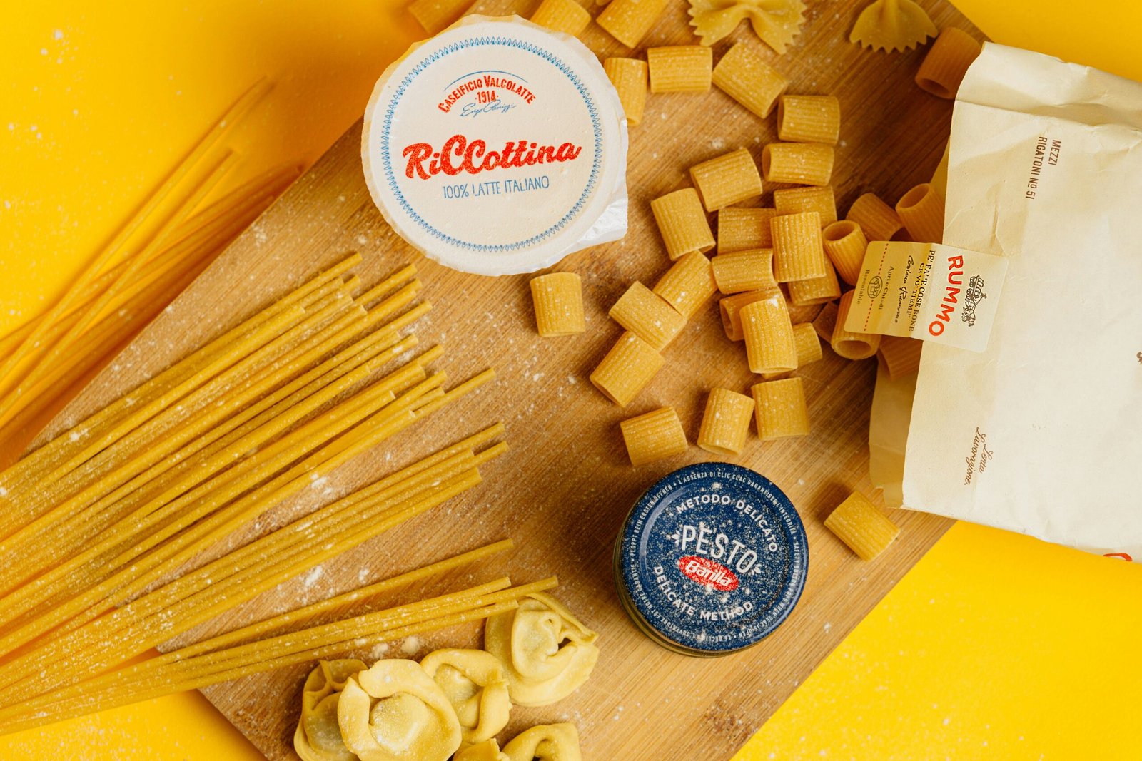 Freshly grated Pecorino Romano cheese and cracked black pepper