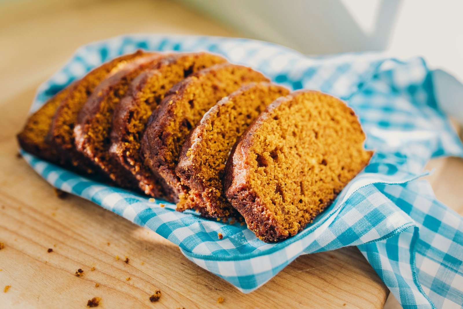 Pumpkin bread ingredients including canned pumpkin and warm spices